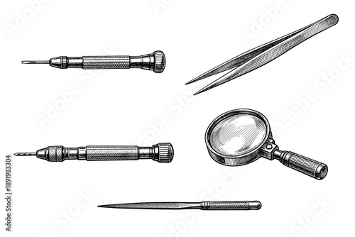 Vintage hand tools: tweezers, magnifying glass, awl, screwdrivers