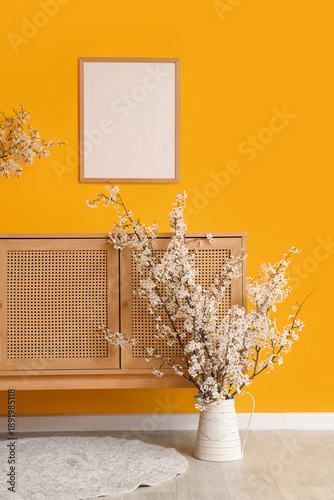 Vase with blossoming branch...