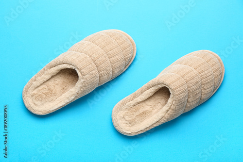 Pair of beige soft slippers...