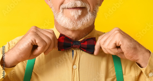 Handsome happy mature man w...