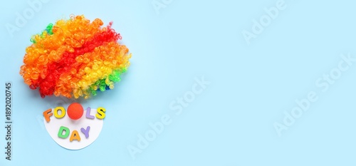 Text FOOLS DAY and clown's ...