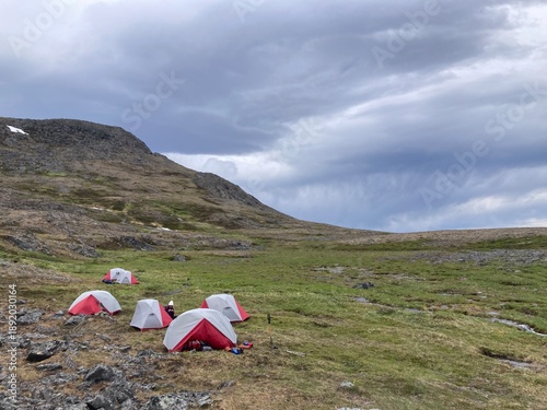 Group of Alpine Tents on Remote Hill in Alaska