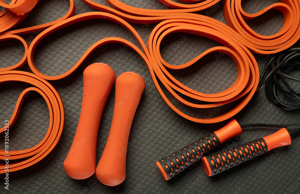 Obraz premium Colorful fitness background with textured accessories