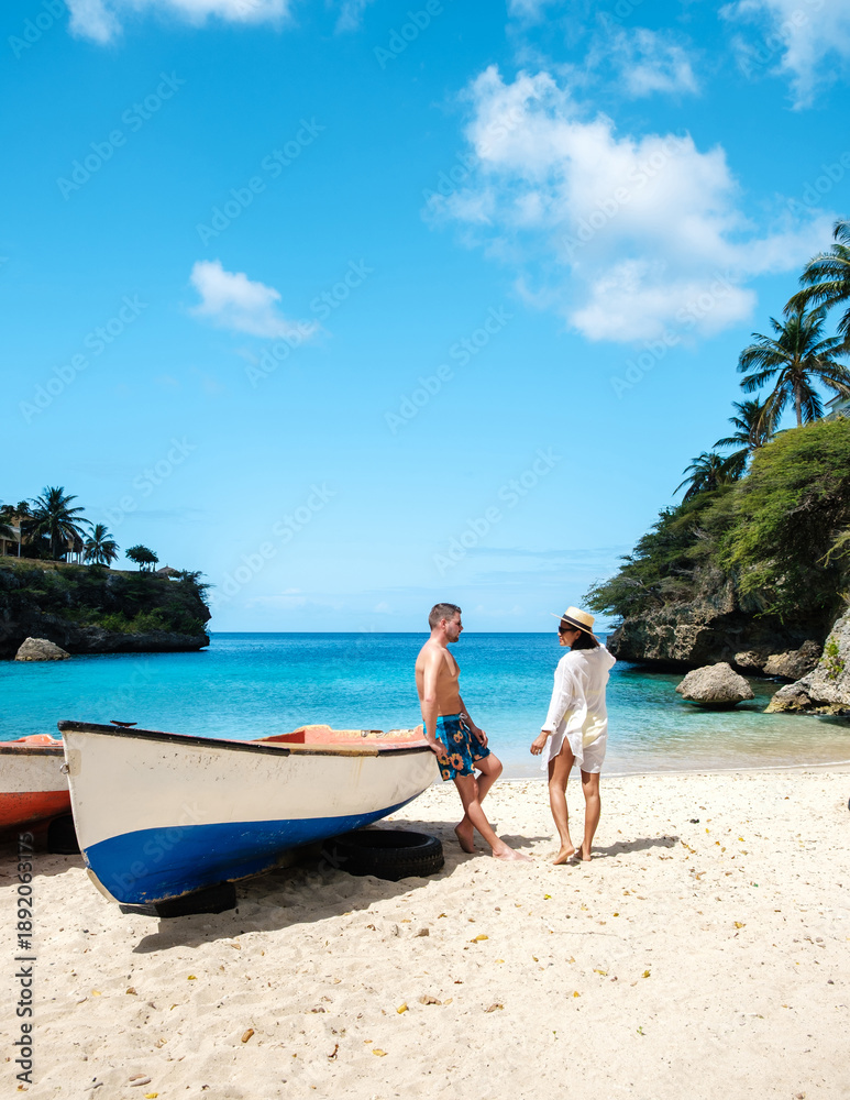 Obraz premium Discover the beauty of playa lagun in Curacao with sun, sand, and smiles