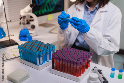 Scientist analyzing medical samples for genetic research