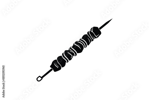 Shish kebab silhouette a traditional grilled dish with meat and vegetables on a skewer
