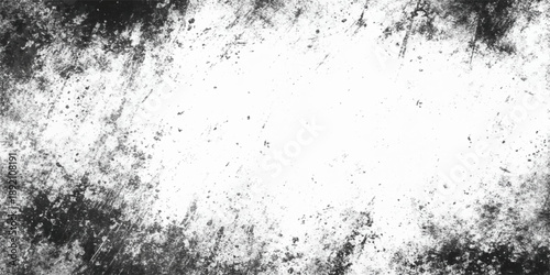 Abstract grunge black and white background with a textured grey concrete wall pattern featuring vintage paint splashes on a rough cement surface