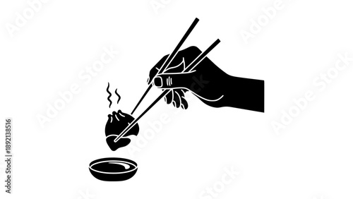 A hand holding chopsticks picking up food from a bowl