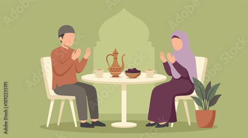 A Muslim couple offering prayers before breaking their fast at home
