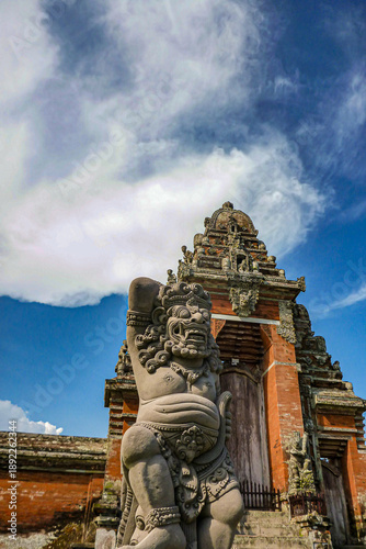 A spirit guardian at the gate of a traditional building in Bali, Indonesia