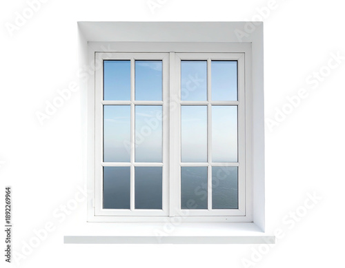 A white framed window with multiple panes overlooks a soft-focus vista of sky and sea