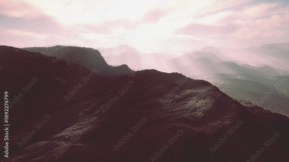 Obraz premium Morning light bathes the rugged hills in soft hues. The tranquil atmosphere invites reflection and appreciation of natures beauty, enhancing the serene mountain vista.