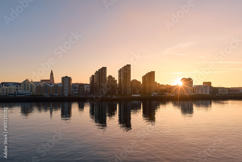 Reykjavik skyline reflecting at golden hour sunset