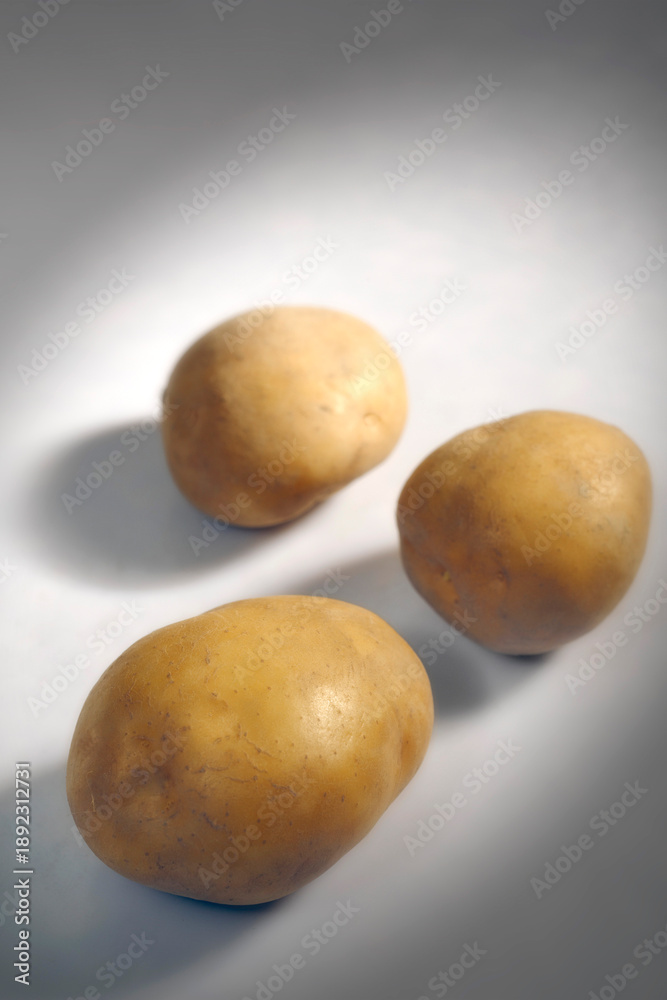 Fototapeta premium potatoes on white background