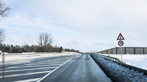 Trees have fallen in the forest due to snow, trees are lying on the roads, roads are closed, snow chaos in Germany, shoveling snow, snow in the forest, snow on the cars, snow in the village