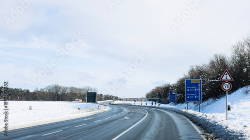 Trees have fallen in the forest due to snow, trees are lying on the roads, roads are closed, snow chaos in Germany, shoveling snow, snow in the forest, snow on the cars, snow in the village