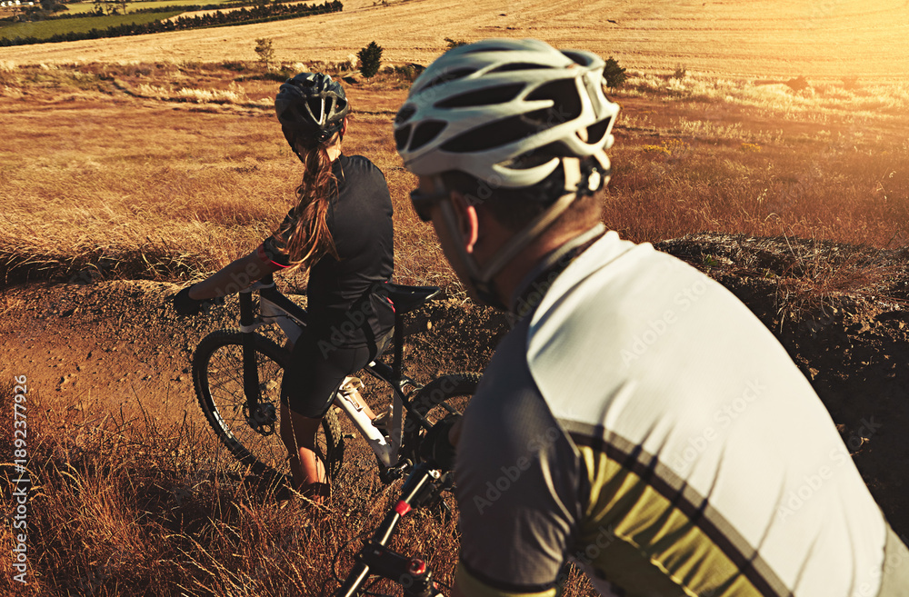 Fototapeta premium Cyclists, exercise and people on bicycles, countryside and fitness for sport competition and cycling. Outdoor, active and friends on bike, travel and cardio for challenge in nature, back or training