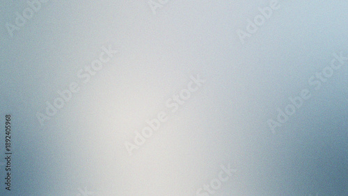 Abstract grey textured backdrop features delicate noise patterns and soft gradient transitions, perfect for modern design projects with grey aesthetic appeal.