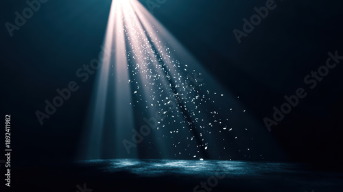 Floating dust particles in sunbeam create magical atmosphere in dark cinematic room, evoking sense of wonder and tranquility