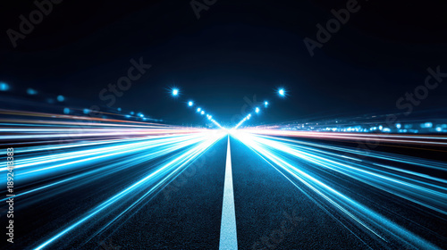 Bright streaks of white and blue light illuminate dark road, creating dynamic sense of speed and movement. perspective draws viewer into scene, evoking excitement and energy