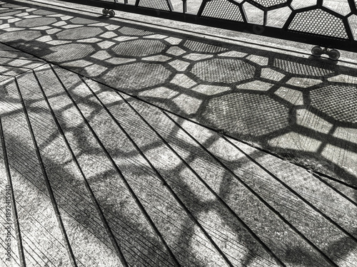 Black and White High Contrast Shadow of Perforated Metal Fence