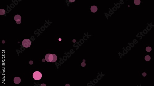 Pink Particles Moving Against Black Background.