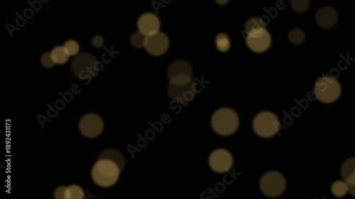 Blurry Golden Lights Against Dark Background.