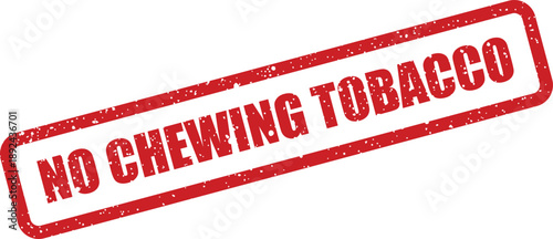 A prominent red rectangular rubber stamp clearly displaying the strict warning NO CHEWING TOBACCO on a white surface