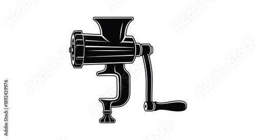 A vintage black meat grinder is depicted in stark contrast against a white background presented as a silhouette