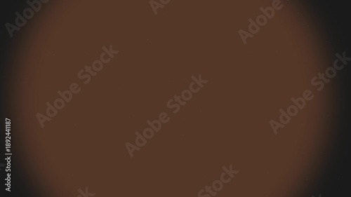 Brown Circle Fades In Black Background.