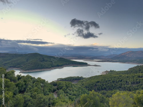 Landscape View of Guadalhorce Dam Affected by Water Shortage at Sunset, Andalusia, Spain