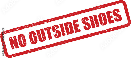 A vibrant red distressed rubber stamp clearly states a rule regarding no outside shoes allowed