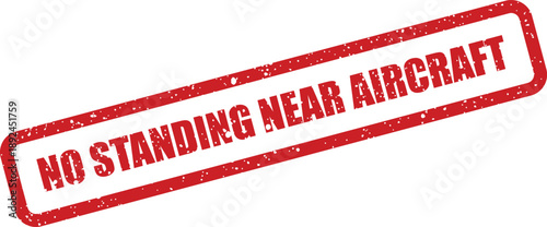 Bold red grunge rubber stamp warns No Standing Near Aircraft with distressed texture on a clean white background