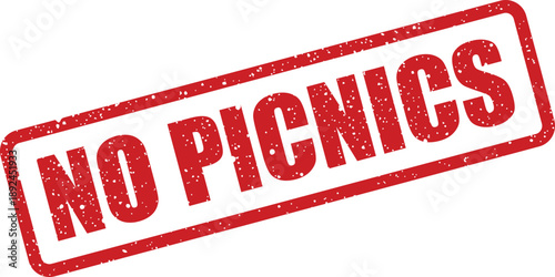 Bold red rectangular grunge rubber stamp clearly indicates that picnicking is not permitted in this area