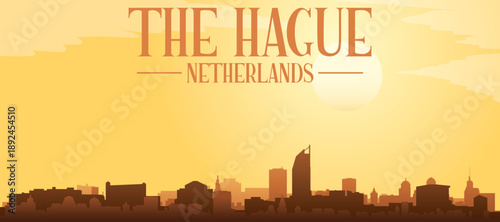 Golden yellow panoramic poster of the city skyline with misty background buildings and clouds of THE HAGUE, NETHERLANDS