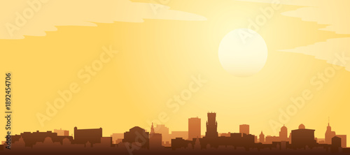Golden yellow panoramic poster of the city skyline with misty background buildings and clouds of BRUGES, BELGIUM