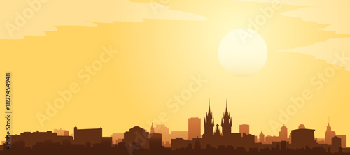 Golden yellow panoramic poster of the city skyline with misty background buildings and clouds of PRAGUE, CZECH REPUBLIC