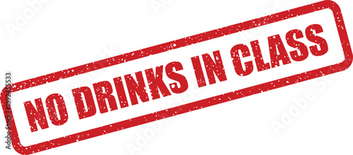 Prominent red rubber stamp displays the clear classroom rule NO DRINKS IN CLASS on a white backdrop