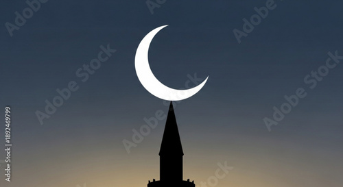 Crescent moon above minaret silhouette at dusk with gradient sky