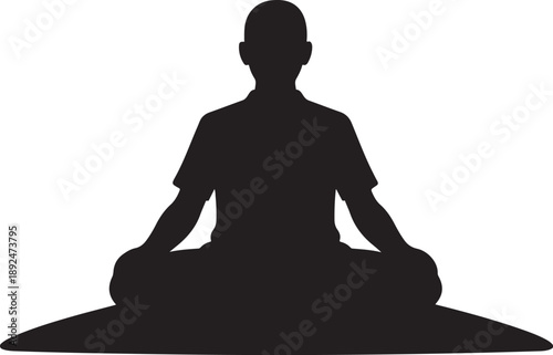 Silhouette of a person meditating in a peaceful setting