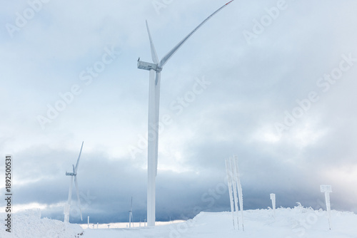 Wallpaper Mural Offshore wind farm - Winter arctic industrial Wind turbine station on the mountain. Torontodigital.ca