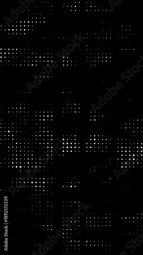 Randomly glowing dots. White dots on black background. Halftone texture animation. Bussines data and technology video effect.