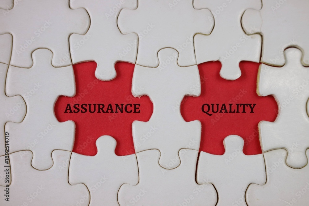Fototapeta premium Interlocking red Puzzle Pieces Representing Assurance And Quality In Business