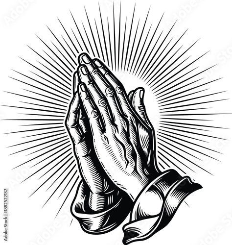 Praying hands with divine light