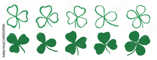 Crayon clover leaves isolated on white background. Set of green shamrock doodles illustration. Lucky shamrock