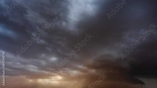 Grey storm clouds moving rapidly across the sky showing dramatic weather change outdoors