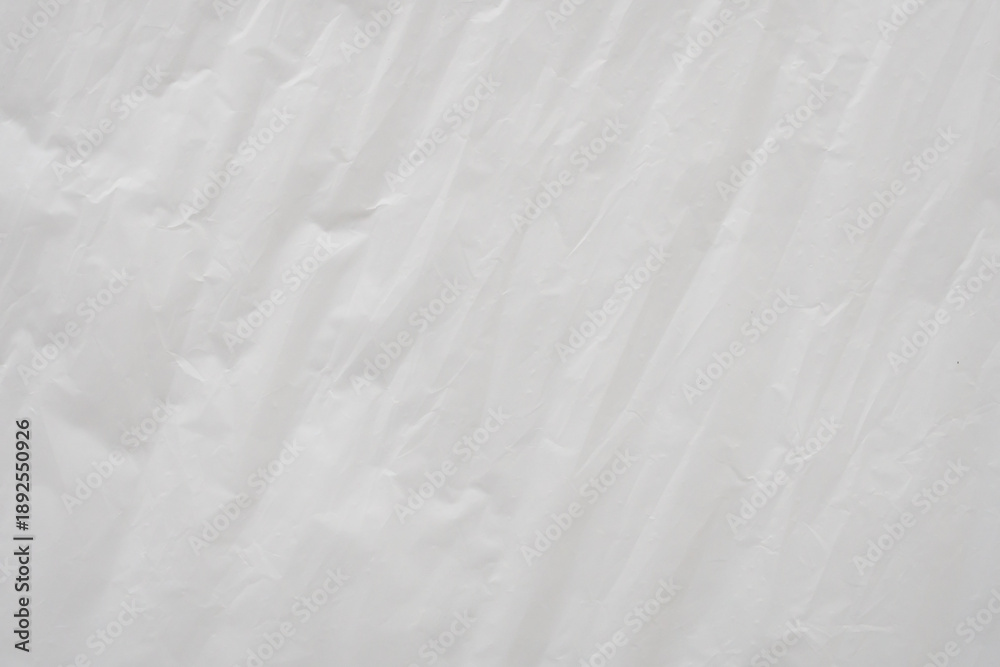 Obraz premium Crumpled White Plastic Sheet Surface Texture Background