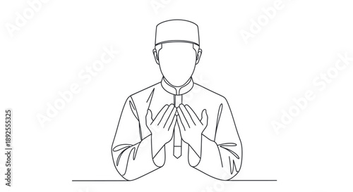 Serene man in traditional attire praying with clasped hands, exuding peace and devotion