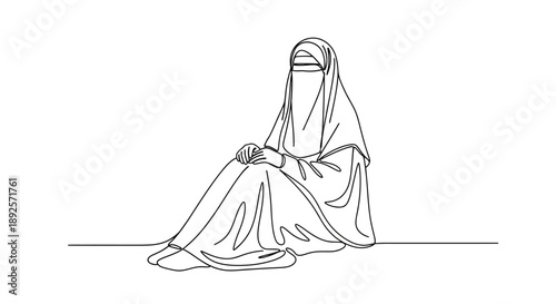Contemplative woman in traditional Middle Eastern attire sitting alone