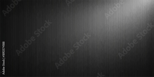 Brushed silver steel and dark metallic grunge texture background with light reflecting on a gray aluminum surface pattern for a textured black plate wallpaper backdrop
